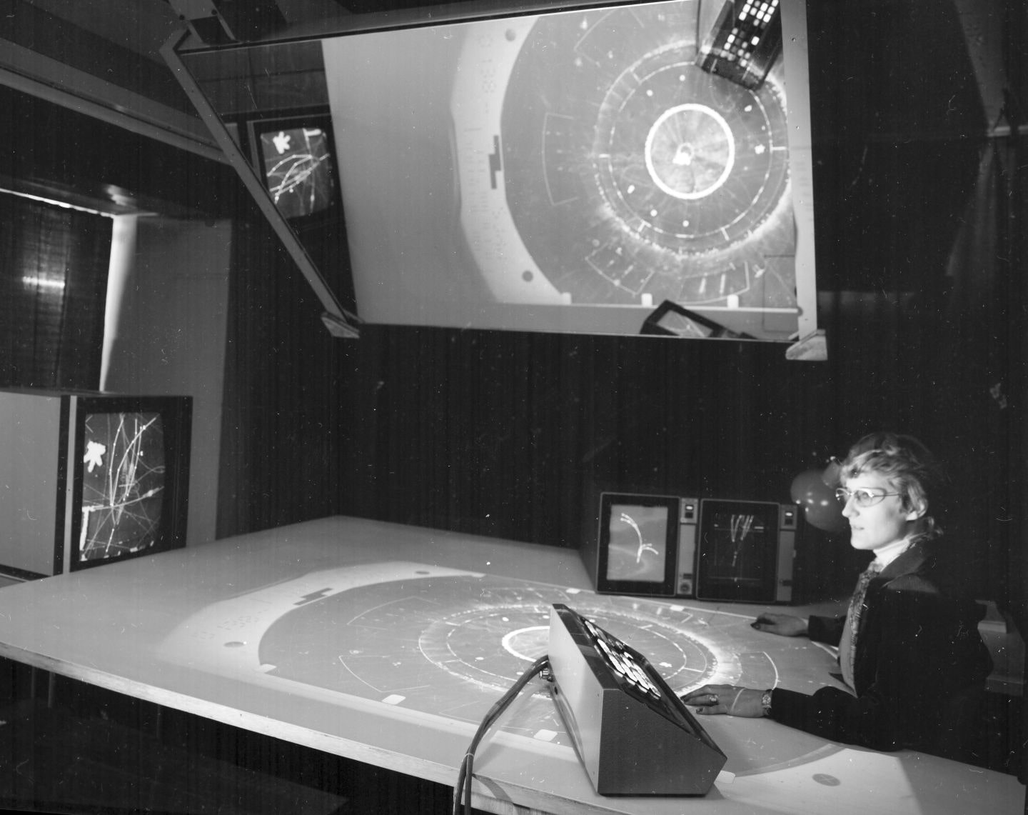 Female sitting at a scanning table